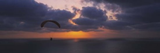 Silhouette of a person paragliding over the sea Blacks Beach San Diego California USA Canvas Art - Panoramic Images (36 x 12)