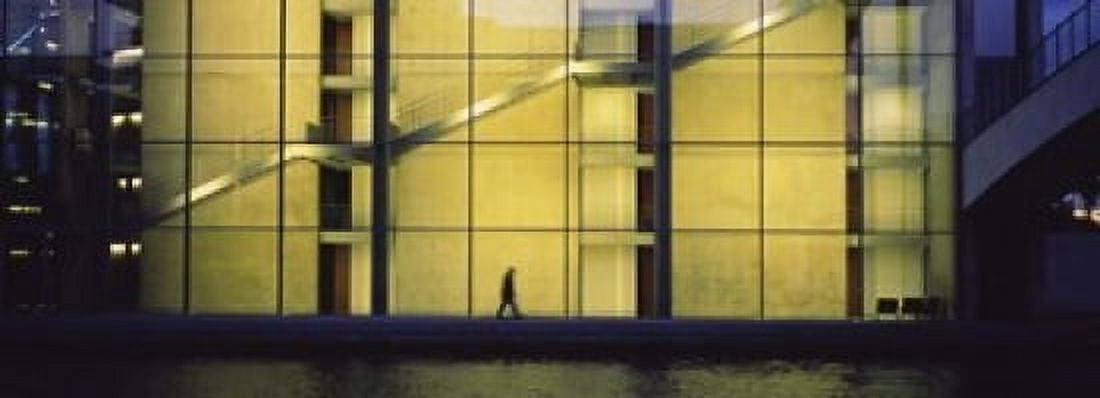 Silhouette of a person walking in front of a building Paul Lobe Haus Berlin Germany Canvas Art - Panoramic Images (18 x 7)