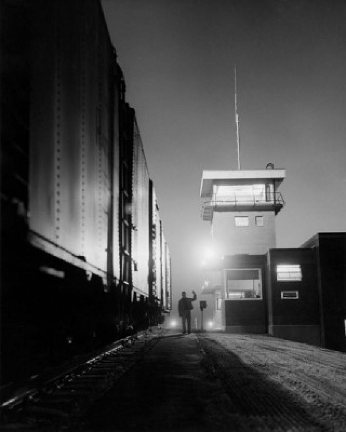 Silhouette of a person waving his hand at a railroad terminal Hamlet North Carolina USA Canvas Art - (24 x 36)