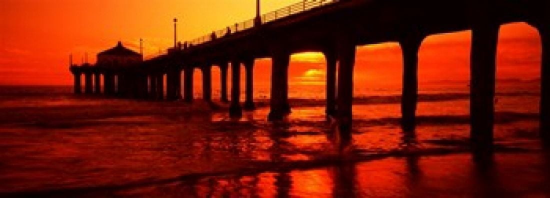 Silhouette of a pier at sunset Manhattan Beach Pier Manhattan Beach Los Angeles County California USA Canvas Art - Panoramic Images (18 x 7)