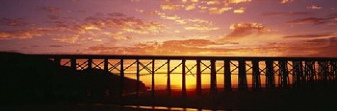 Silhouette of a railway bridge Pudding Creek Bridge Fort Bragg California USA Canvas Art - Panoramic Images (18 x 6)