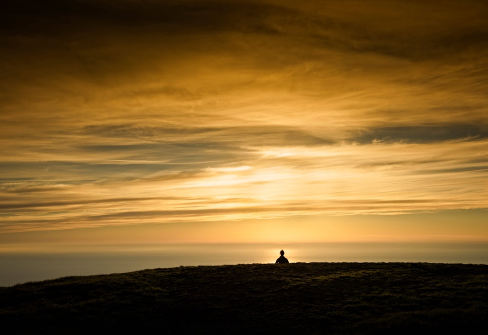 Silhouette of a woman meditating on top of a mountain California USA Canvas Art - Panoramic Images (24 x 36)