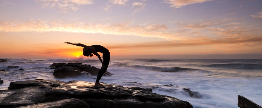 Silhouette of a woman practicing yoga on the coast Ballito KwaZulu-Natal South Africa Canvas Art - Panoramic Images (36 x 12)