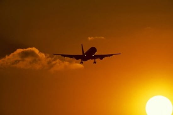 Silhouette of airliner in golden sunset Canvas Art - Panoramic Images (24 x 16)