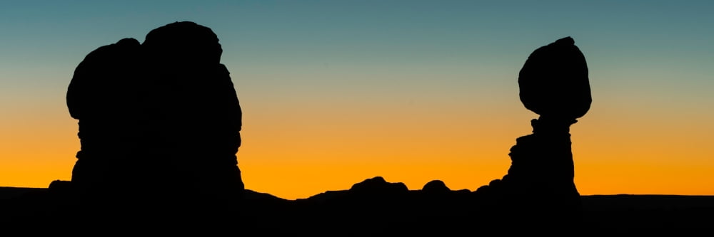 Silhouette of balanced rocks Arches National Park Utah USA Canvas Art - Panoramic Images (12 x 36)