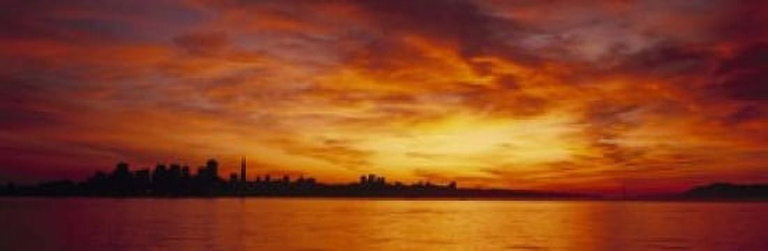 Silhouette of buildings at the waterfront San Francisco California USA Canvas Art - Panoramic Images (18 x 6)