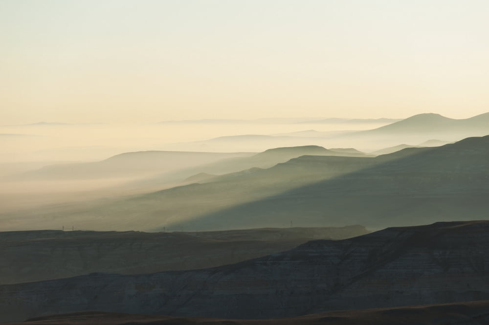 Silhouette of curves in the landscape in the fogGoreme nevsehir turkey Canvas Art - Keith Levit Design Pics (38 x 24)