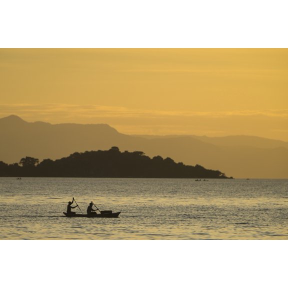 Silhouette of fishermen in dugout canoe leaving Cape Maclear in the evening Lake Malawi Malawi Canvas Art - Ian Cumming Design Pics (19 x 12)