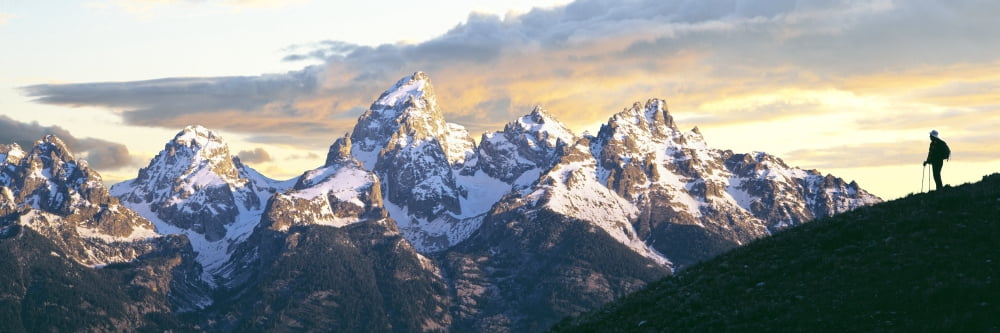 Silhouette of hiker looking at Teton Range from Schwabachers Landing Grand Teton National Park Wyoming USA Canvas Art - Panoramic Images (27 x 9)