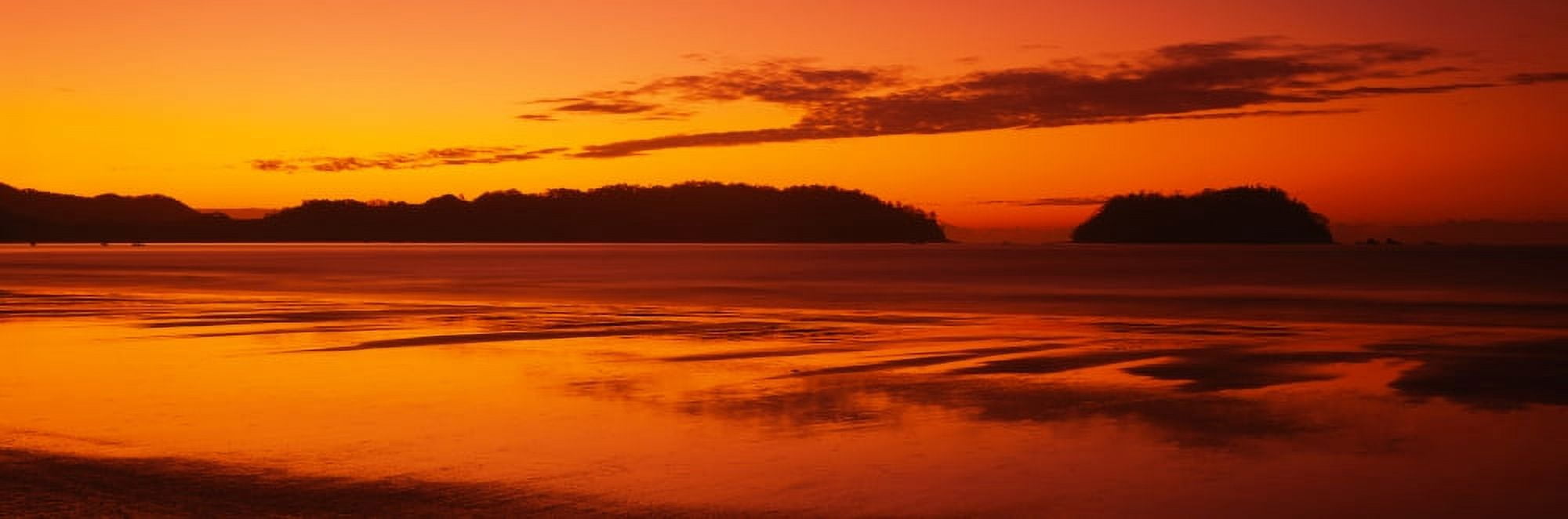 Silhouette of hills at sunrise Samara Beach Guanacaste Province Costa Rica Canvas Art - Panoramic Images (27 x 9)