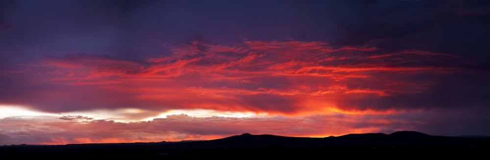 Silhouette of mountain range at sunset Taos Taos County New Mexico USA Canvas Art - Panoramic Images (36 x 12)