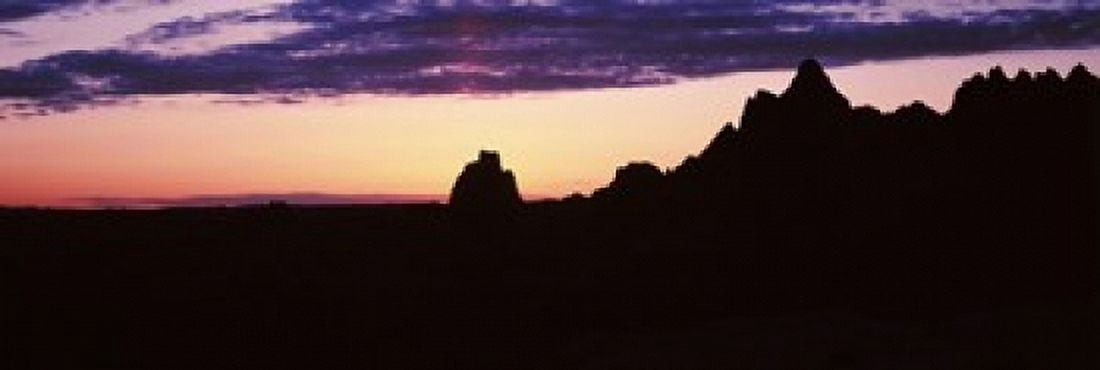 Silhouette of mountains at dusk Badlands National Park South Dakota USA Canvas Art - Panoramic Images (36 x 12)