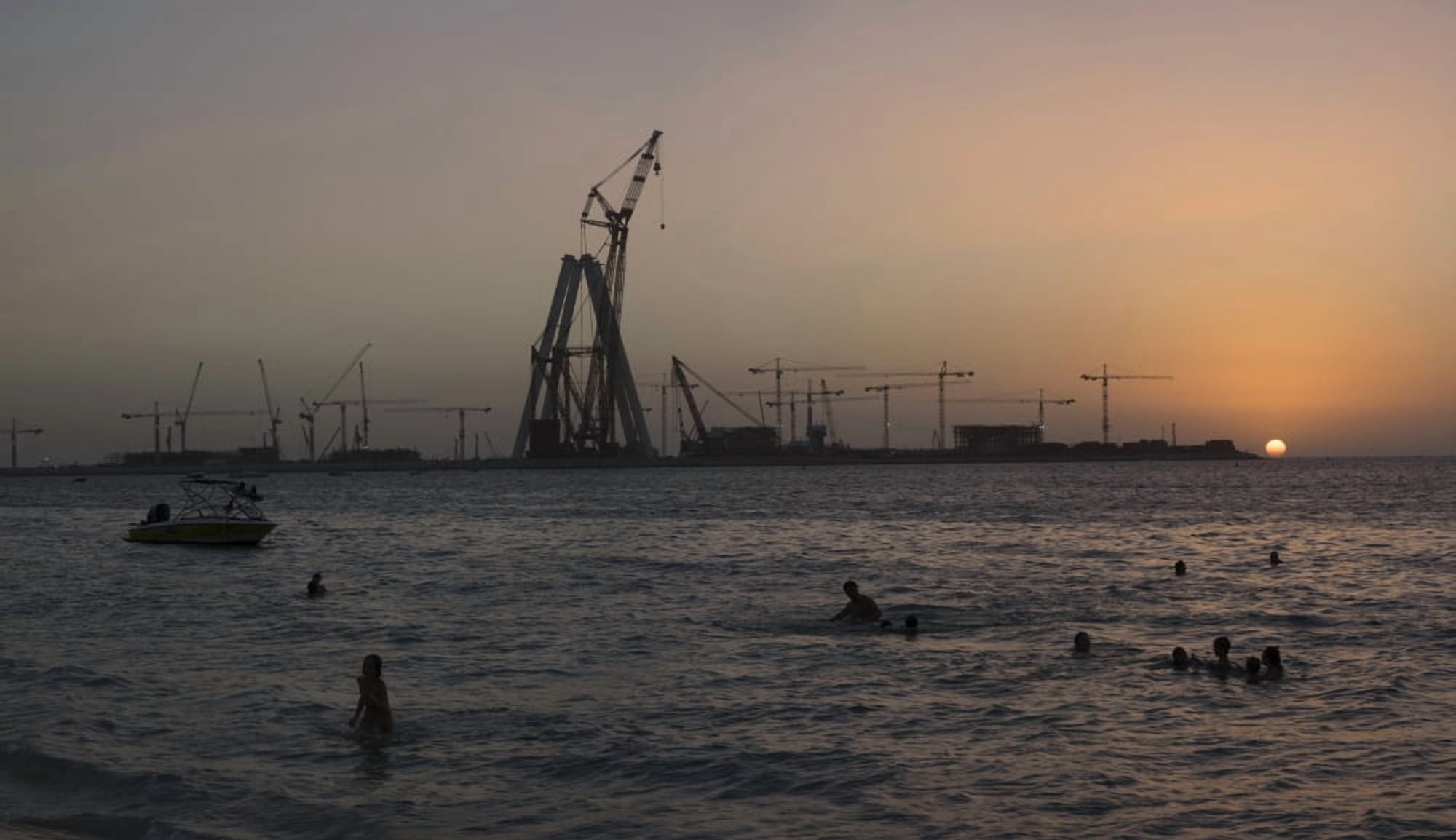 Silhouette of people at Marina Beach Dubai United Arab Emirates Canvas Art - Panoramic Images (20 x 12)