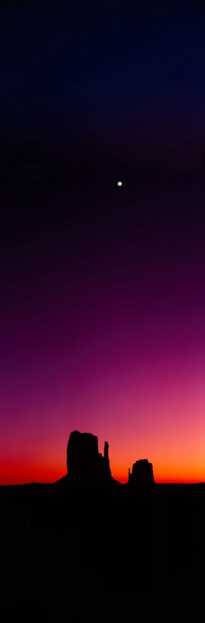 Silhouette of rock formations The Mittens Monument Valley Arizona USA Canvas Art - Panoramic Images (27 x 9)