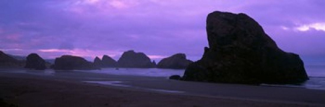Silhouette of rock formations in the sea Myers Creek Beach Oregon USA Canvas Art - Panoramic Images (18 x 6)