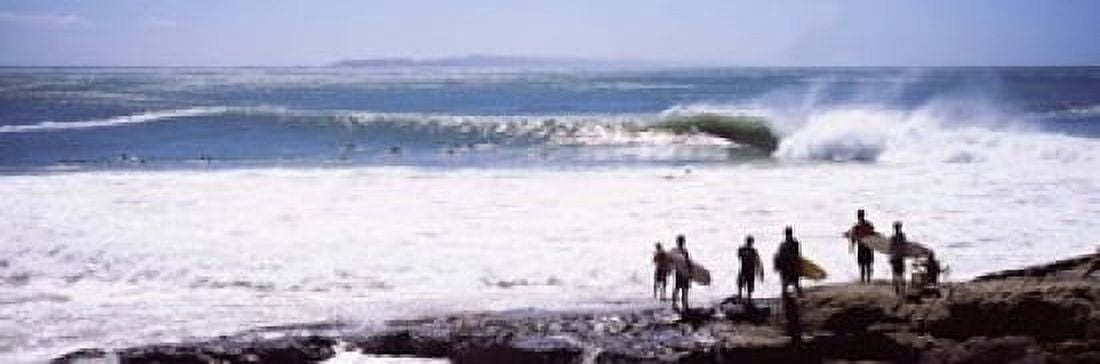 Silhouette of surfers standing on the beach Australia Canvas Art - Panoramic Images (18 x 6)