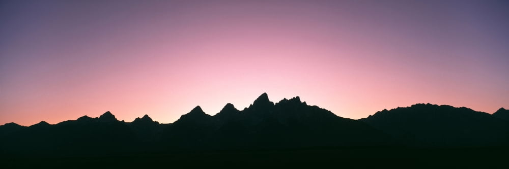 Silhouette of the Teton Range at sunset Grand Teton National Park Wyoming USA Canvas Art - Panoramic Images (27 x 9)