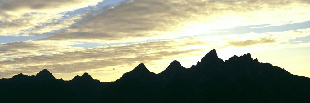 Silhouette of the Teton Range at sunset Grand Teton National Park Wyoming USA Canvas Art - Panoramic Images (36 x 12)