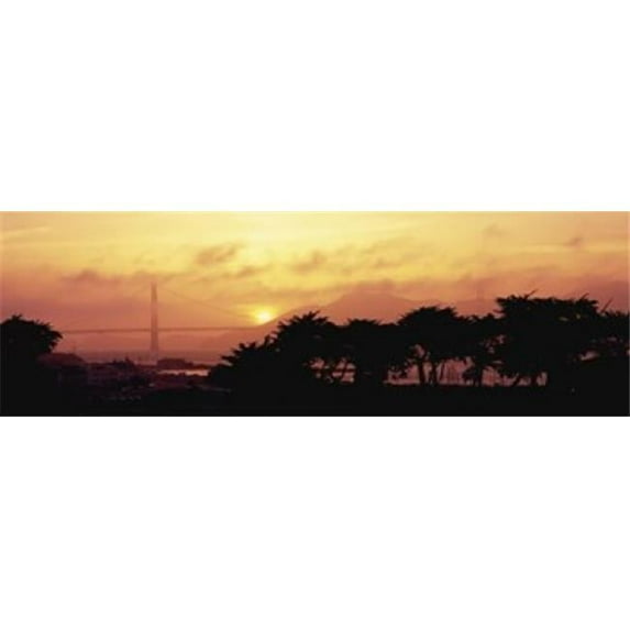 Silhouette of trees at dusk with a bridge in the background Golden Gate Bridge San Francisco California USA Poster Print by - 36 x 12