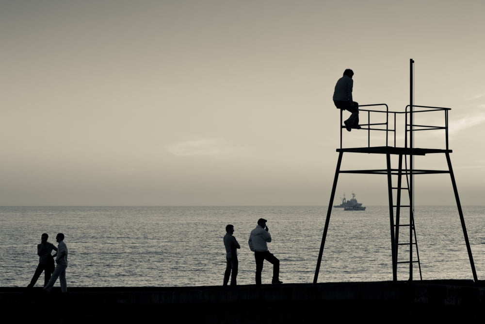 Silhouette people on pier at sunset Lighthouse Beach Sochi Black Sea Coast Krasnodar Krai Russia Canvas Art - Panoramic Images (36 x 12)