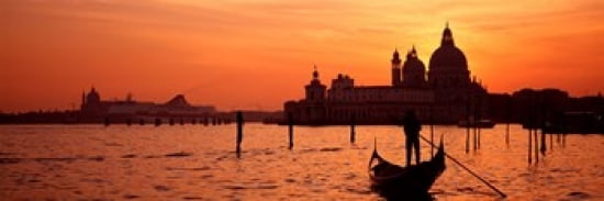 Silhouette of a person on a gondola with a church in background Santa Maria Della Salute Grand Canal Venice Italy Canvas Art - Panoramic Images (36 x 13)