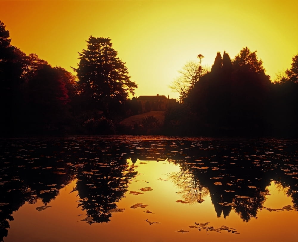 Silhouetted Home And Trees Near Water Canvas Art - The Irish Image Collection Design Pics (32 x 26)