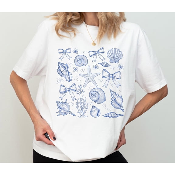 Simple Fit Coquette Seashell Shirt, Seastar Bow Shirt, Summer Vacation Shirt, Summer Beach Trip Tee, Ocean Botanical Woman Shirt, Beach Vibes Shirt All Size S-5XL