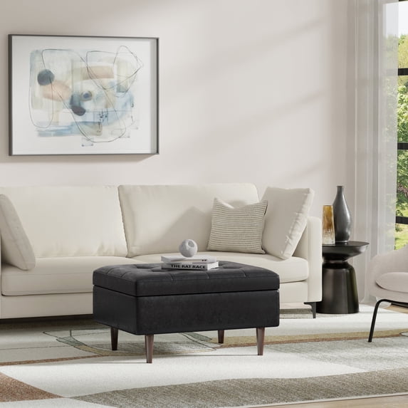 Simpli Home Shay 34 inch Wide Mid Century Modern Rectangle Mid Century Small Rectangle Coffee Table Storage Ottoman in Distressed Black Vegan Faux Leather