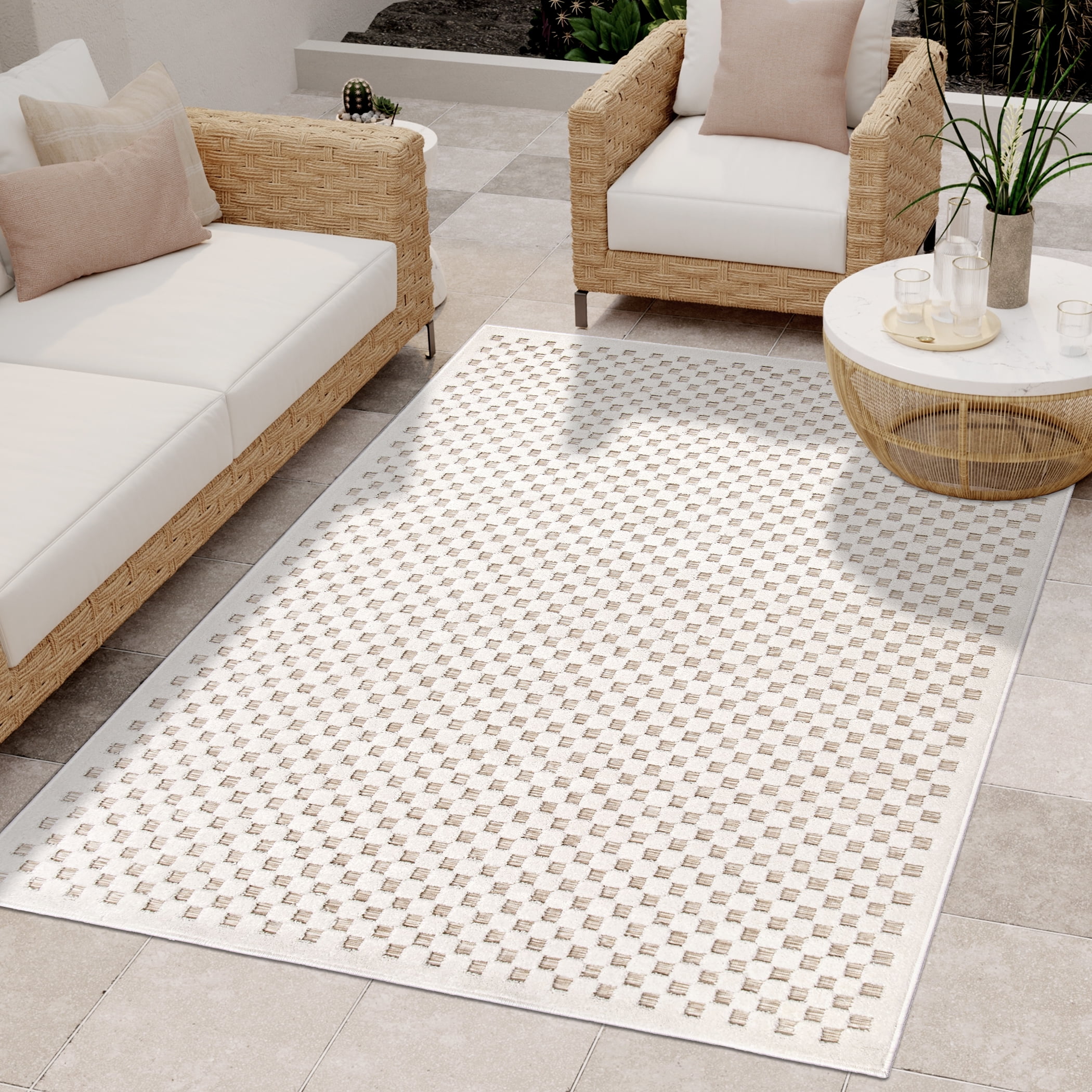 Beige and Off-White 6' x 9' Synthetic Indoor/Outdoor Area Rug