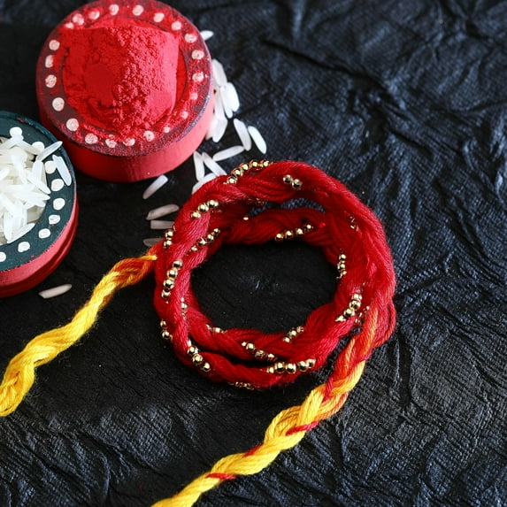Single Rakhi for Brother Rakhi Thread for Bhai Bhabhi Bhaiya and Bhatiji veera Raksha Bandhan Rakhi Set Dora Bracelet Kalwa with gift Pack in Red Bag for Brother Sister Indian Traditional Festival