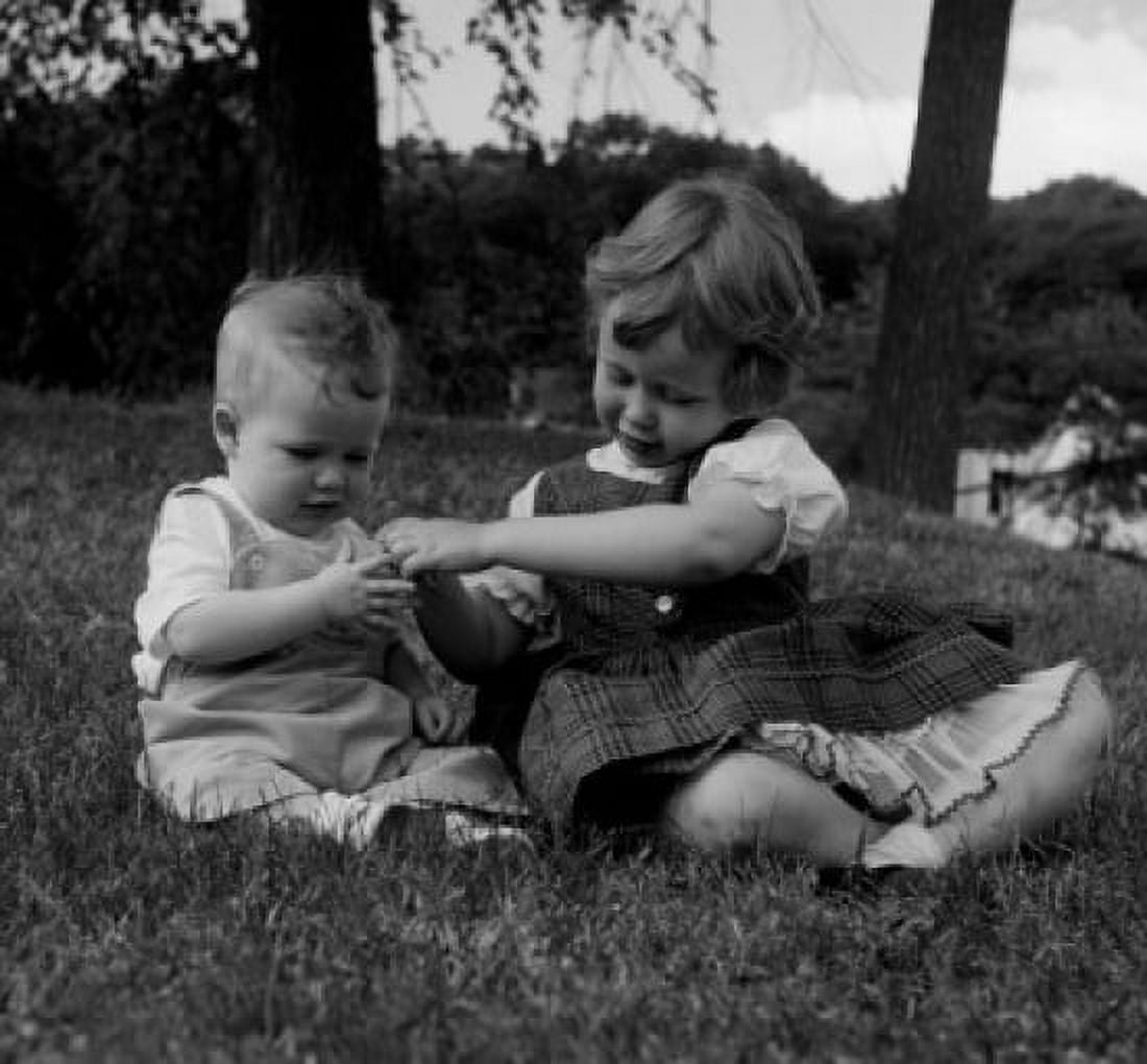 Sister playing with younger brother Canvas Art - (18 x 24)