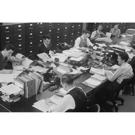 Six Men And Two Women At Work In A U.S. Government Office. They Share A Long Table History (24 x 18)