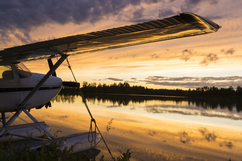 Six Mile Lake and float planes at sunset near Anchorage Alaska Canvas Art - Michael DeYoung Design Pics (38 x 24)