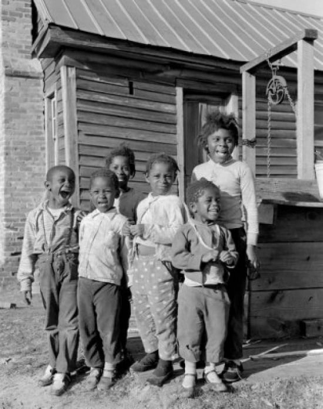 Six children standing outside house Canvas Art - (18 x 24)