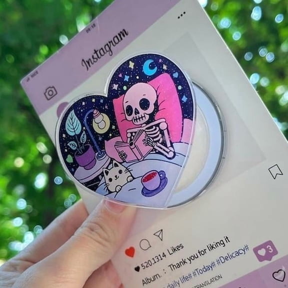 Skeleton & Cat Magnetic PopSocket: Cute Heart-Shaped Phone Grip, Nighttime Skeleton Reading with Cat, Kawaii Magsafe Phone Holder