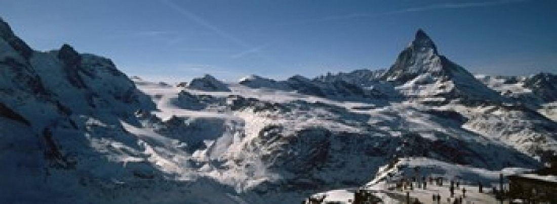 Skiers on mountains in winter Matterhorn Switzerland Canvas Art - Panoramic Images (18 x 7)