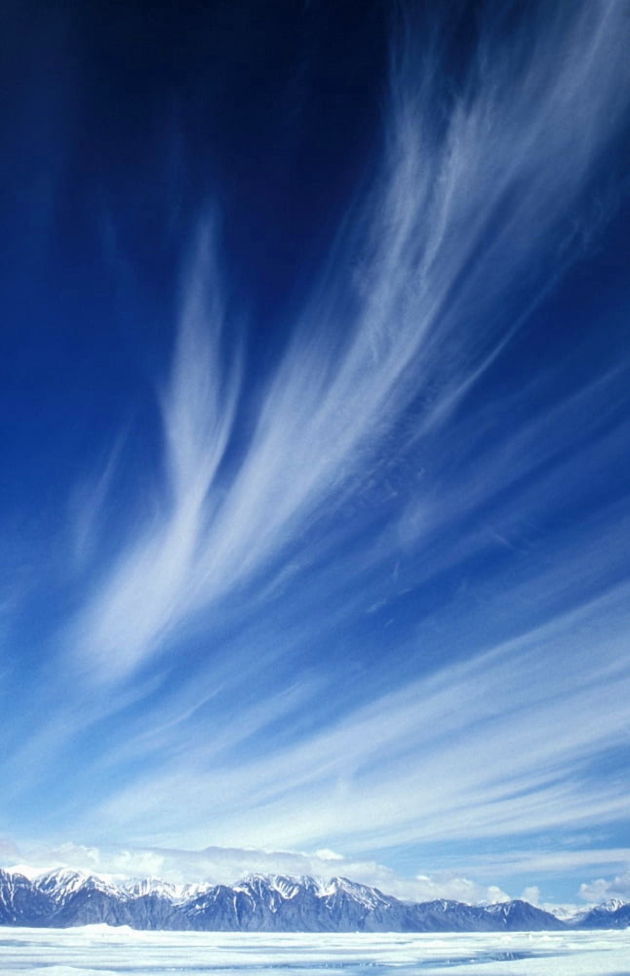 Sky Over Mountains Bylot Island Nunavut Canvas Art - Kevin Spreekmeester Design Pics (12 x 18)