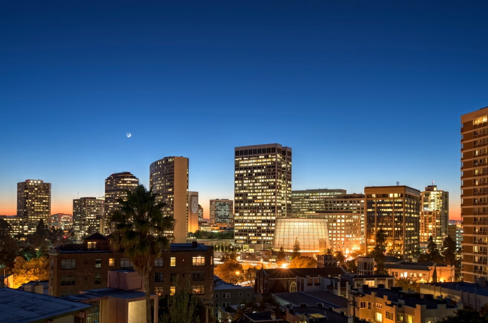 Skyline at dusk Oakland Alameda County California USA Canvas Art - Panoramic Images (18 x 24)