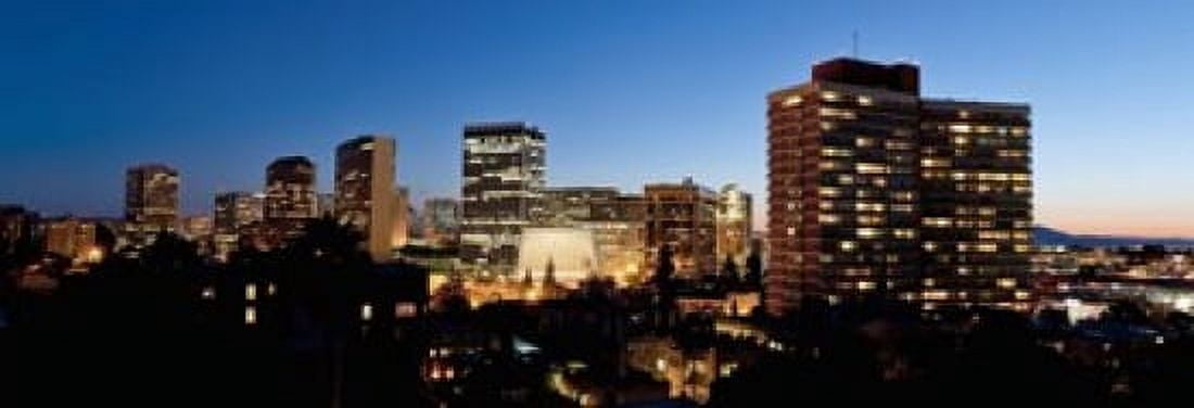 Skyline at dusk Oakland California USA Canvas Art - Panoramic Images (18 x 7)