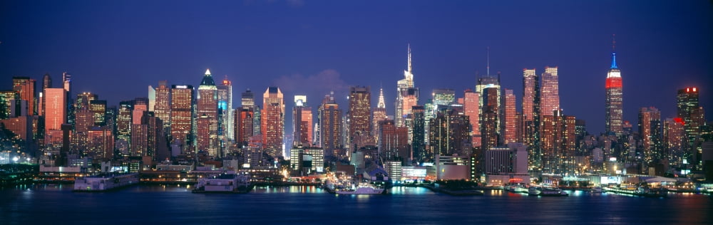 Skylines at dusk Manhattan New York City New York State USA Canvas Art - Panoramic Images (27 x 9)