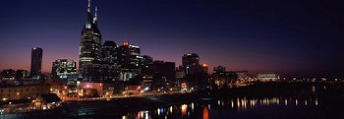 Skylines at night along Cumberland River Nashville Tennessee USA 2013 Canvas Art - Panoramic Images (36 x 13)