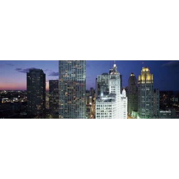 Skyscraper lit up at night in a city Chicago Illinois USA Canvas Art - Panoramic Images (36 x 12)