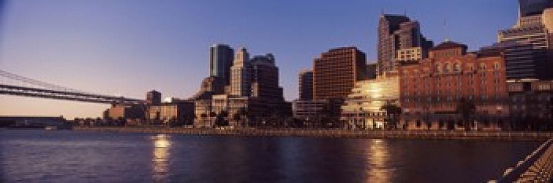 Skyscrapers and Bay Bridge at sunset San Francisco Bay San Francisco California USA 2012 Canvas Art - Panoramic Images (18 x 6)