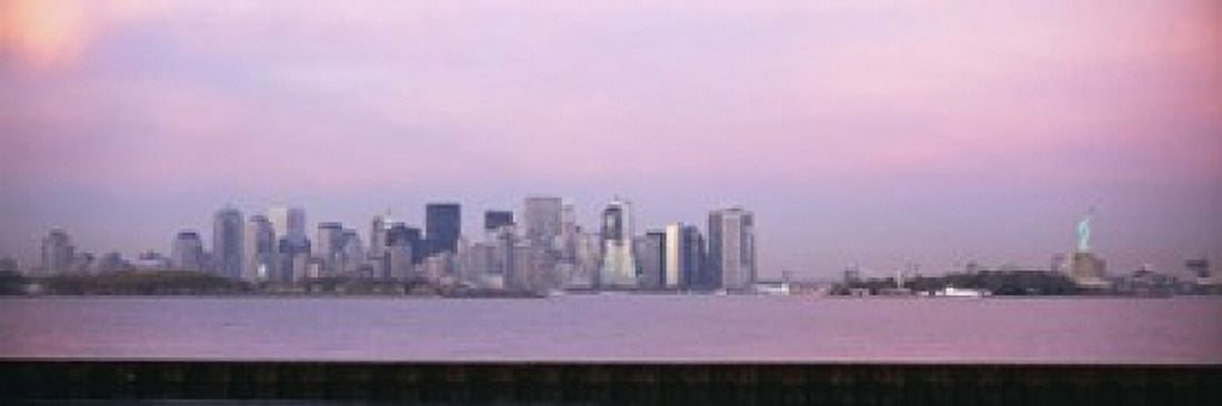 Skyscrapers and a statue at the waterfront Statue of Liberty Manhattan New York City New York State USA Canvas Art - Panoramic Images (18 x 6)