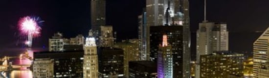 Skyscrapers and firework display in a city at night Lake Michigan Chicago Illinois USA Canvas Art - Panoramic Images (38 x 12)
