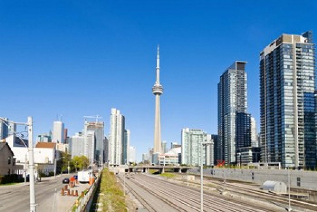 Skyscrapers and railway yard with CN tower in the background Toronto Ontario Canada 2013 Canvas Art - Panoramic Images (36 x 24)