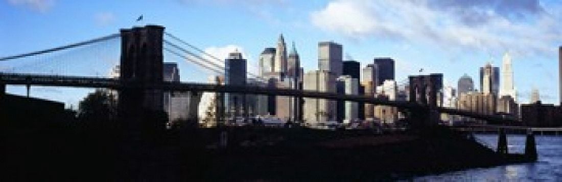 Skyscrapers at the waterfront Brooklyn Bridge East River Manhattan New York City New York State USA Canvas Art - Panoramic Images (18 x 6)
