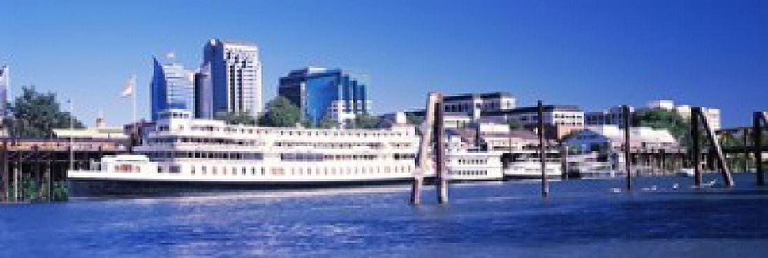 Skyscrapers at the waterfront Delta King Hotel Sacramento California USA 2012 Canvas Art - Panoramic Images (36 x 12)