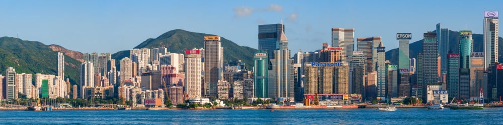 Skyscrapers at the waterfront Hong Kong China Canvas Art - Panoramic Images (5 x 20)