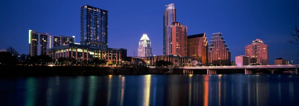 Skyscrapers at the waterfront Lady Bird Lake Austin Texas USA Canvas Art - Panoramic Images (27 x 9)